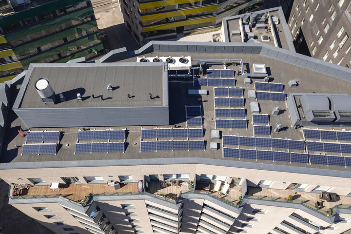 Solar panels on commercial highrise building - commercial flat roof solar panels 3
