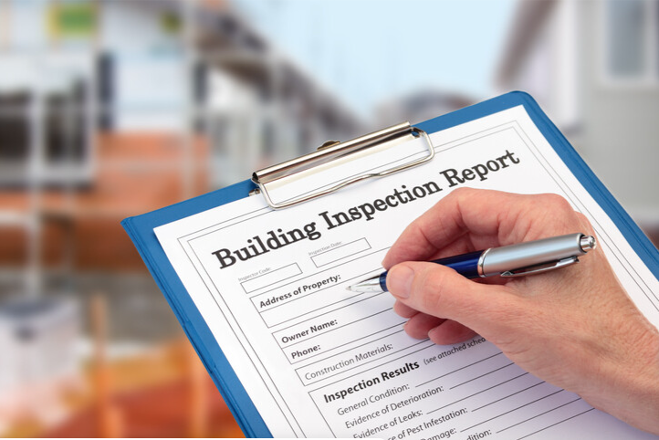 commercial roofing inspection report on a clipboard